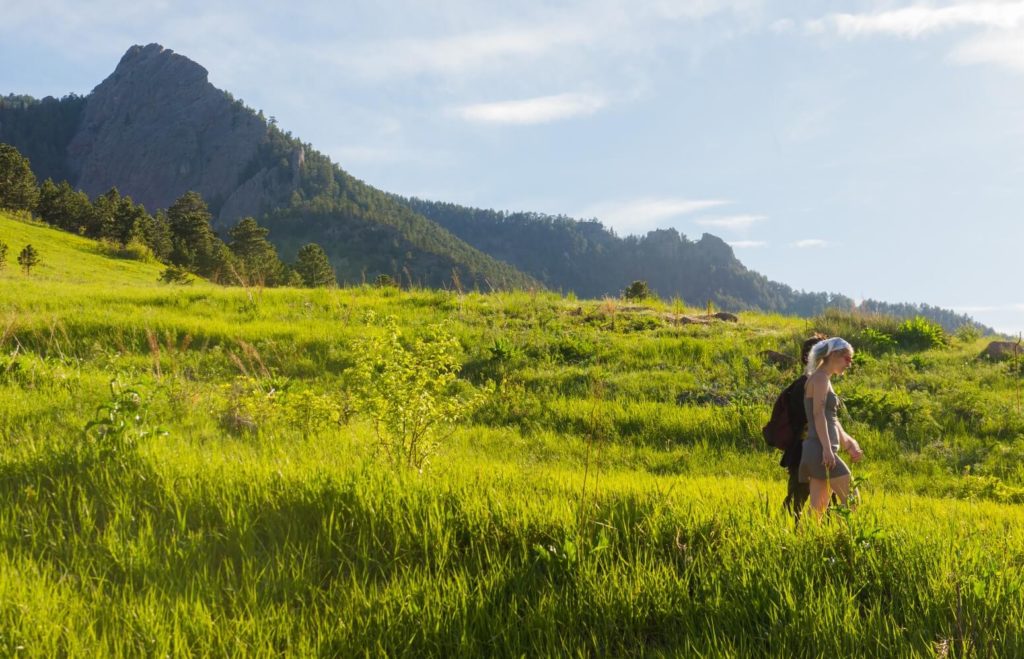 Couple walking through valley
